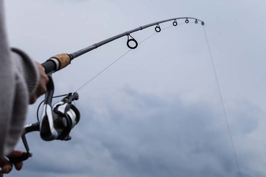 How do you string a Fishing Pole?