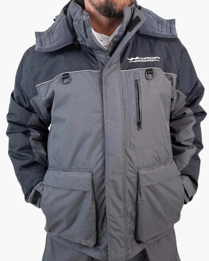 Detail of grey and navy blue ice gear gear showing waterproof construction and features