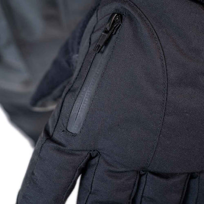 Detail view of insulated ice gear jacket showing insulation and pocket features