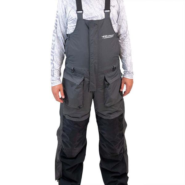 Grey and navy blue waterproof ice gear bibs showing functional design features