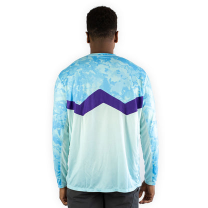 Man in caribbean cove blue sol invictus pro shirt front view studio shot arms at sides