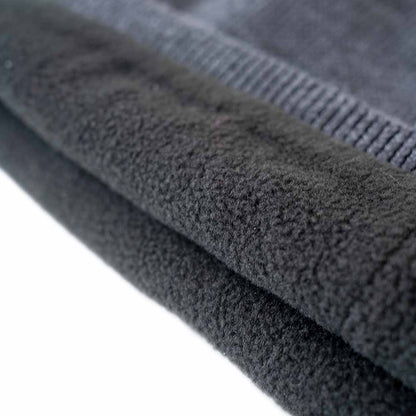 Detail view of insulated ice gear jacket showing insulation and pocket features