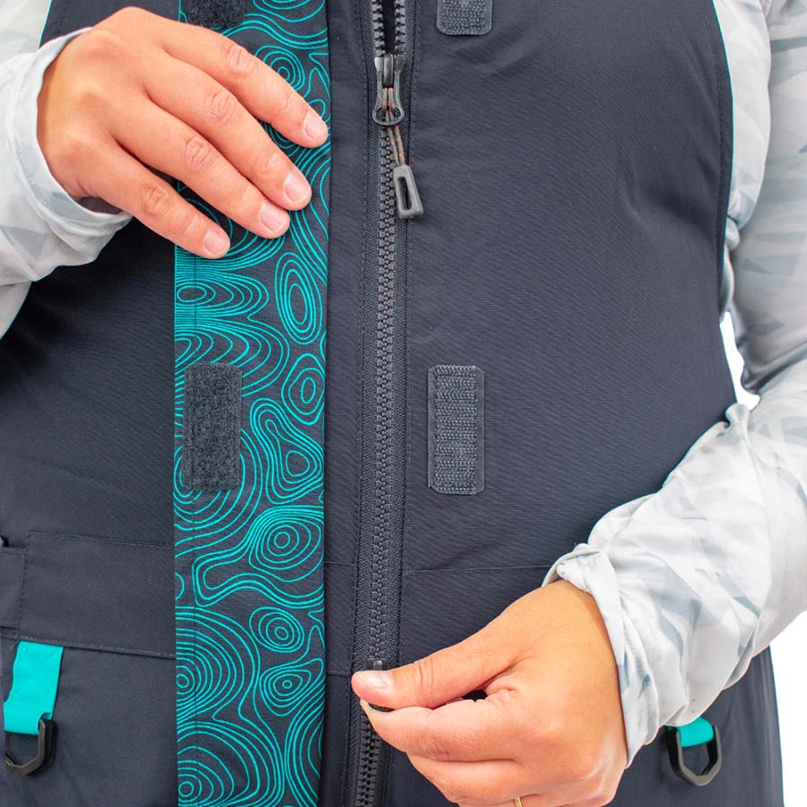 Insulated waterproof ice gear bibs showing functional design features