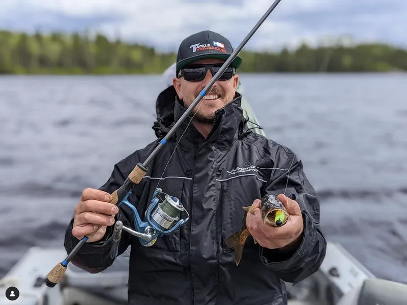 Angler fishing from boat in WindRider rain gear