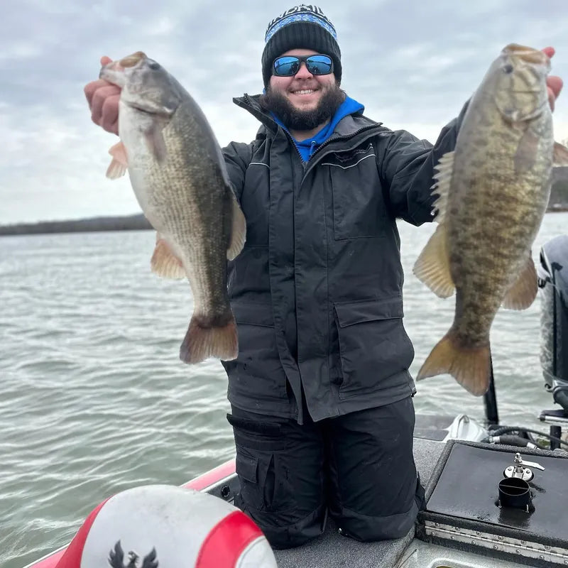 Happy angler with big catches wearing WindRider