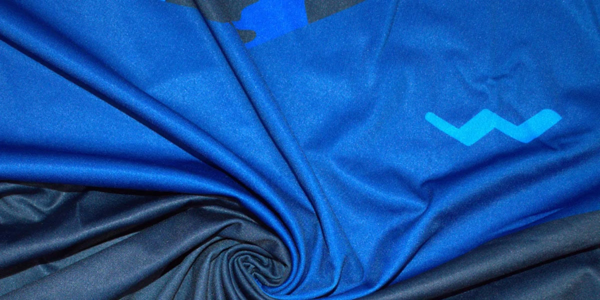 Close-up of blue Helios performance fabric and WindRider mark.